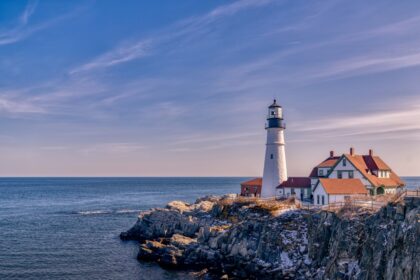 Portland Head Light on a rocky cliff above the ocean in Cape Elizabeth