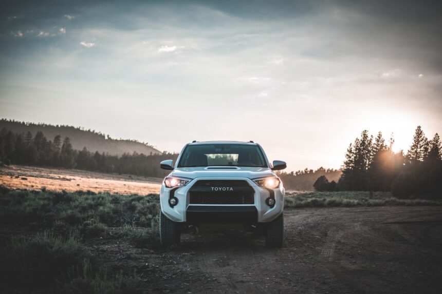 parked white Toyota vehicle