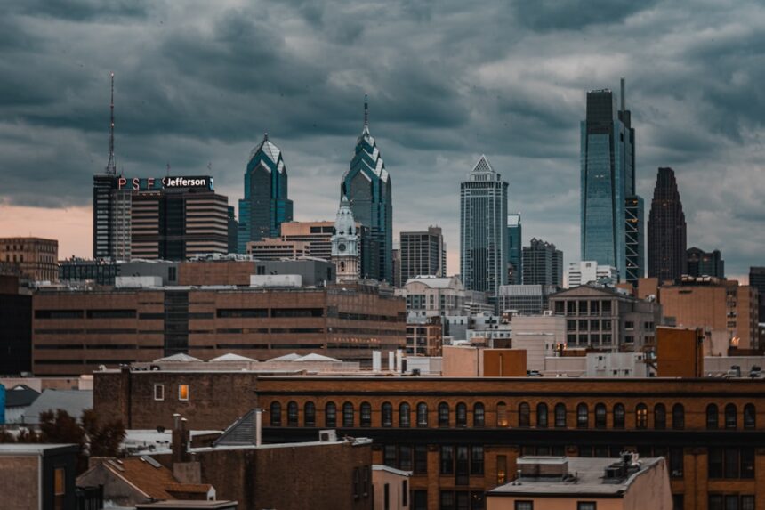City skyline with modern skyscrapers under cloudy sky