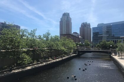 body of water near high-rise buildings