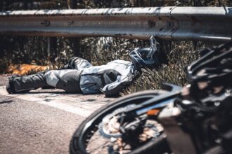 a person lying on a bench