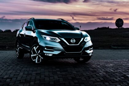 gray Nissan Rogue SUV outdoor during nighttime
