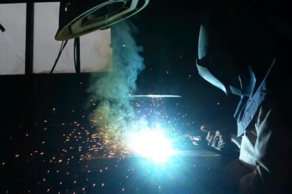 a welder working on a piece of metal