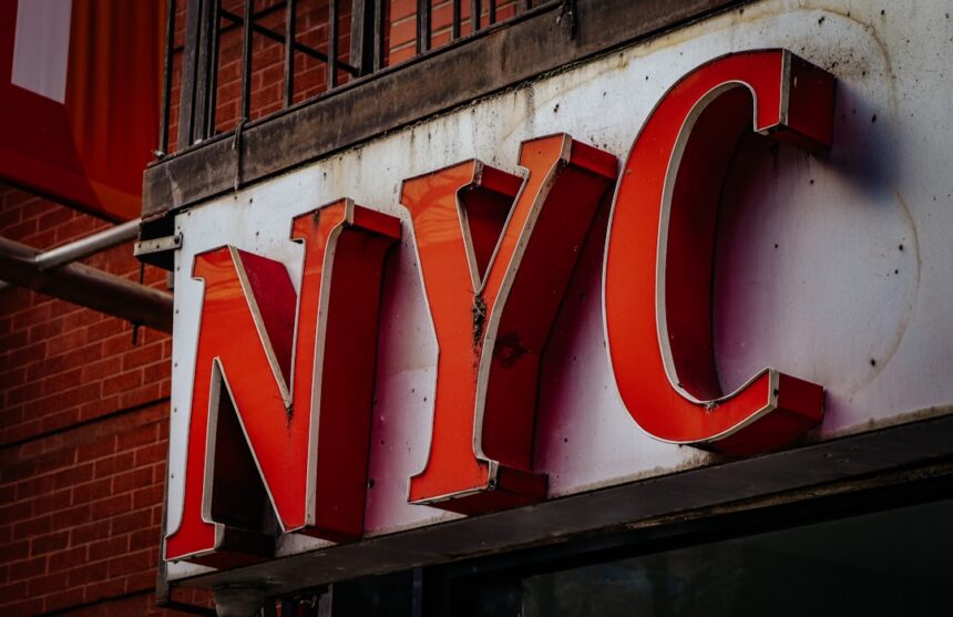 a close up of a sign on the side of a building